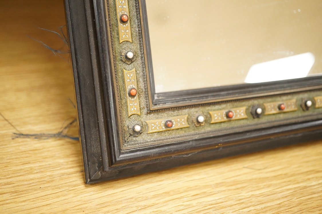 A Viennese strut mirror with inlaid metal detail, marked verso ‘Fr. Rosenberg Wien Graben 17’, 43 x 31cm